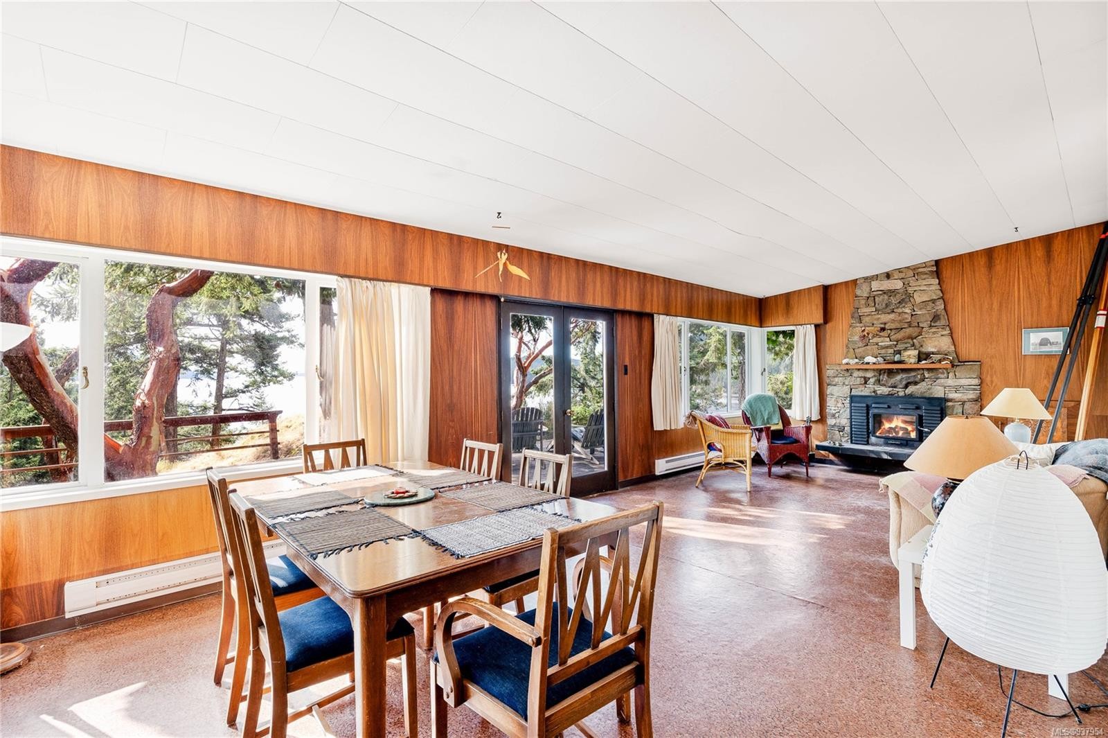 498 Marine Trnabt, Mayne Island, BC - Indoor Photo Showing Dining Room With Fireplace