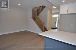 KItchen Island Stairs to upstairs -