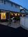 Solar string lights, pool deck lights, fence lighting.  Great space even at night.