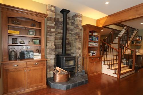 6308 Ash Road, Wasa, BC - Indoor Photo Showing Other Room With Fireplace
