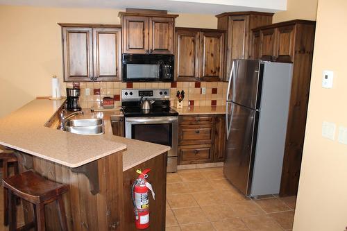 E2-D - 1351 Gerry Sorensen Way, Kimberley, BC - Indoor Photo Showing Kitchen With Double Sink