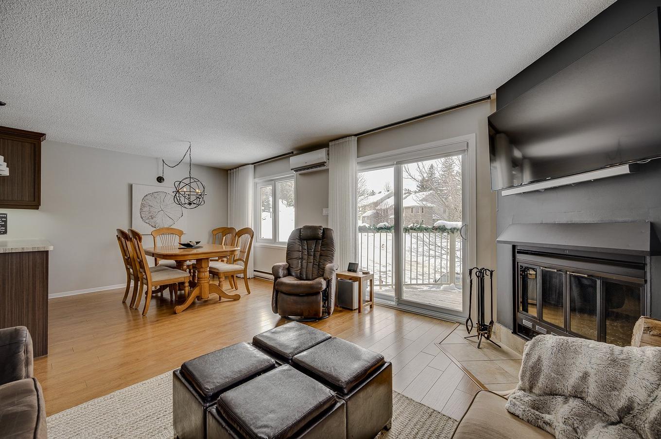 Salon - 602 Ch. Du Skieur, Piedmont, QC - Indoor Photo Showing Living Room With Fireplace