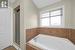 347 Ellwood Dr W Principal Bedroom separate shower and soaker tub