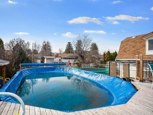 1251 Lawson Avenue, Kelowna, BC - Outdoor With Above Ground Pool With Backyard