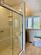 Ensuite has an over-sized shower with glass door.