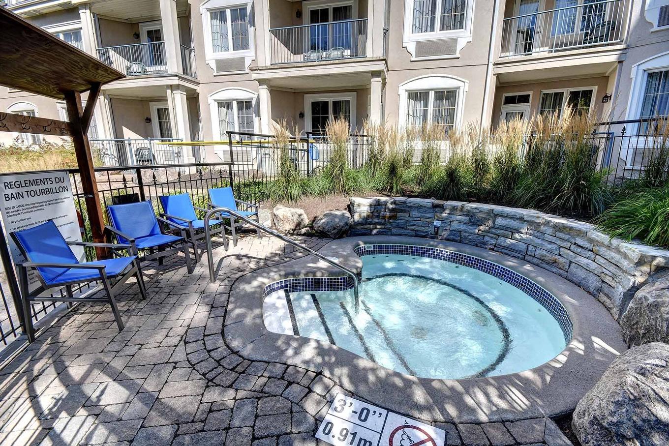 Spa - 336-160 Ch. Du Curé-Deslauriers, Mont-Tremblant, QC - Outdoor With Balcony