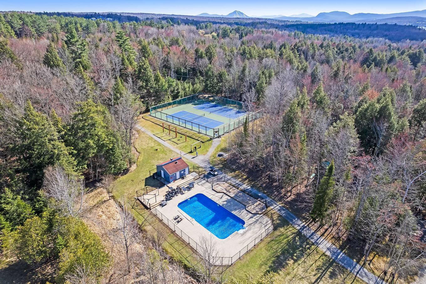 Aerial photo - 747 Ch. Des Pommetiers, Magog, QC - Outdoor With In Ground Pool With View