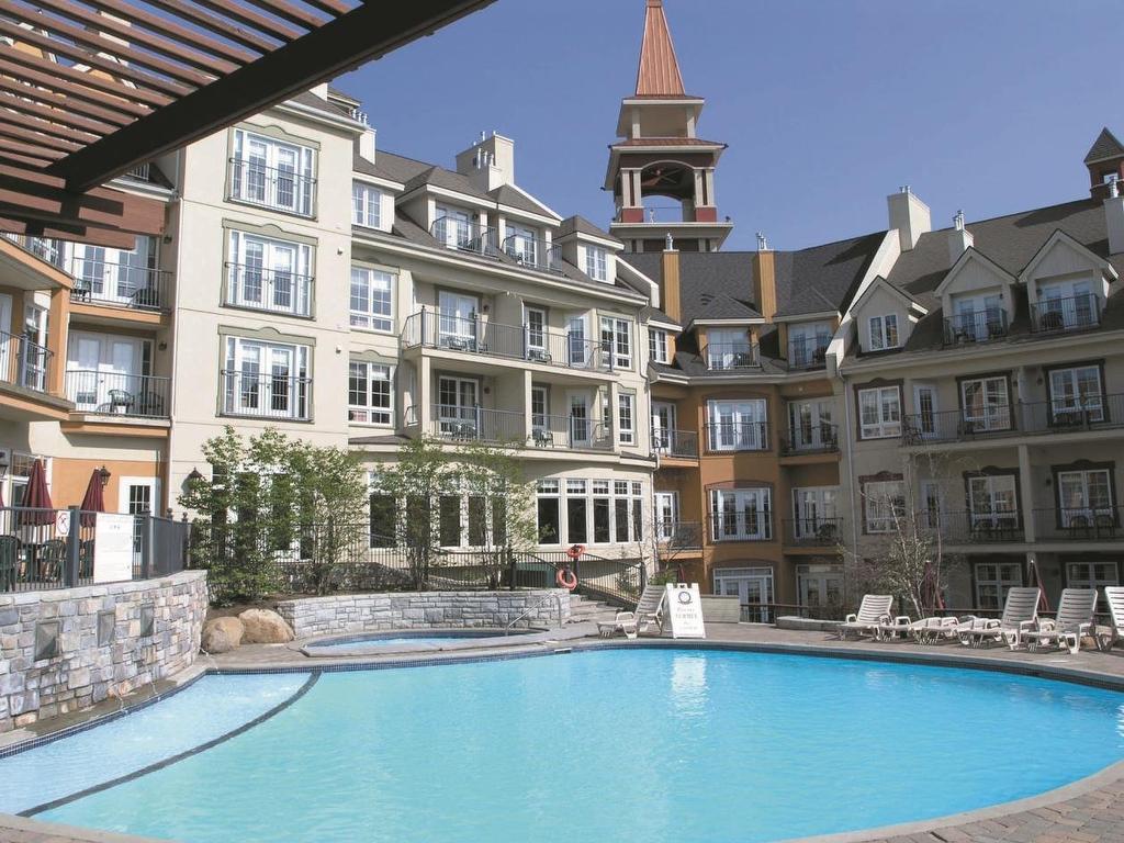 Piscine - 142-151 Ch. Du Curé-Deslauriers, Mont-Tremblant, QC - Outdoor With In Ground Pool With Facade