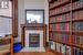 Original wood buring fireplace mantel & built in library