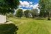 Side yard view from the driveway