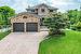 Stamped concrete driveway and metal roof