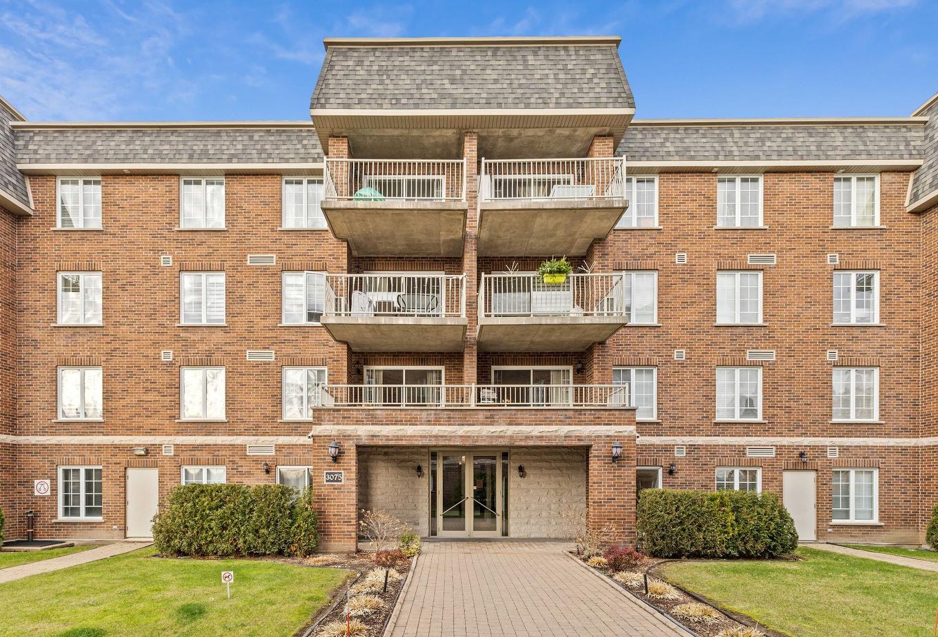Frontage - 101-3075 Av. Ernest-Hemingway, Montréal (Saint-Laurent), QC - Outdoor With Balcony With Facade