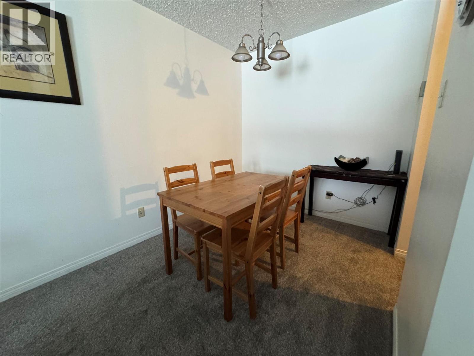 212 Spieker Avenue Unit# 315, Tumbler Ridge, BC - Indoor Photo Showing Dining Room