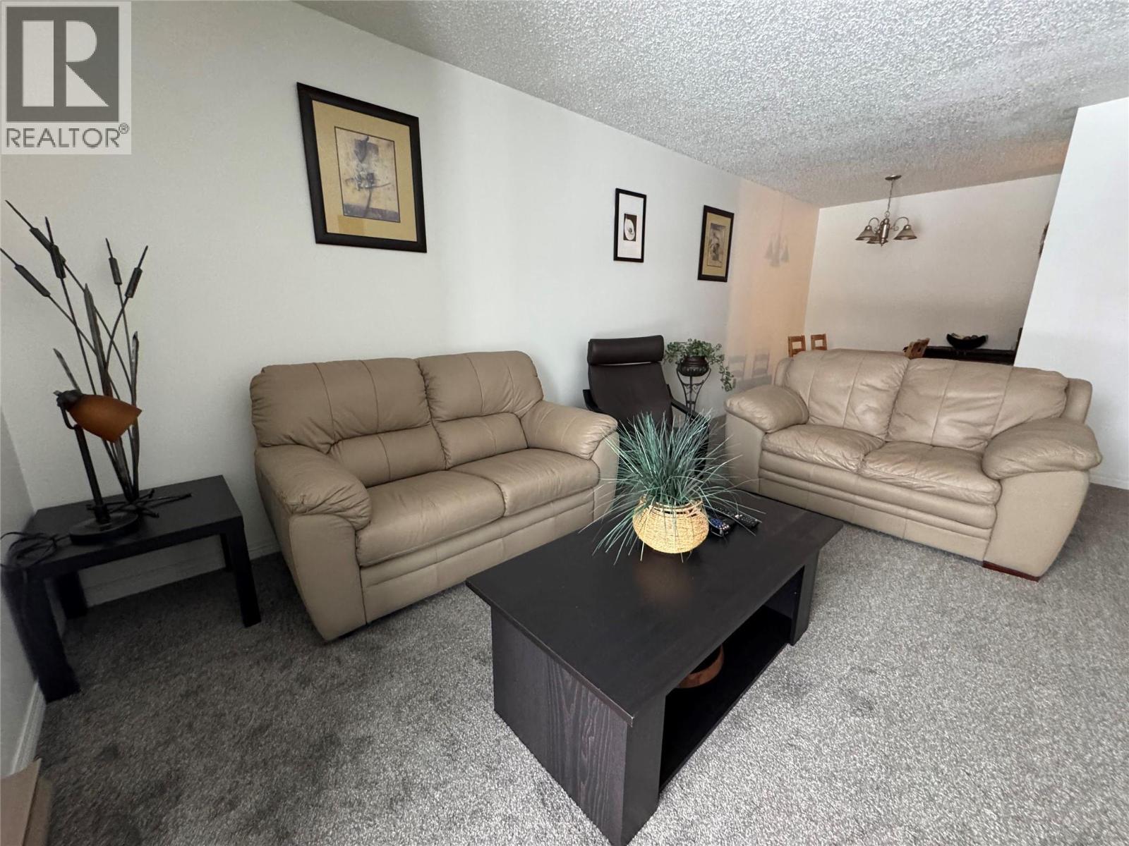 212 Spieker Avenue Unit# 315, Tumbler Ridge, BC - Indoor Photo Showing Living Room