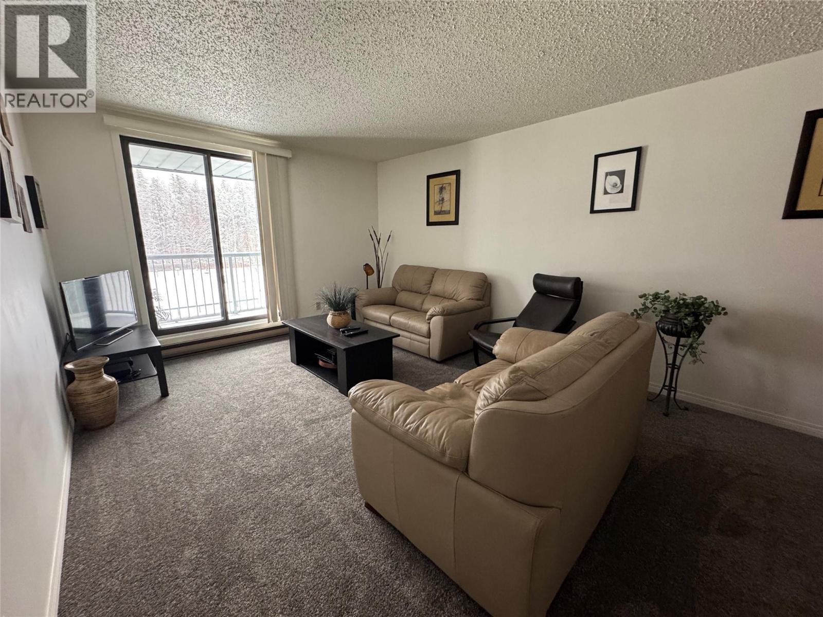 212 Spieker Avenue Unit# 315, Tumbler Ridge, BC - Indoor Photo Showing Living Room