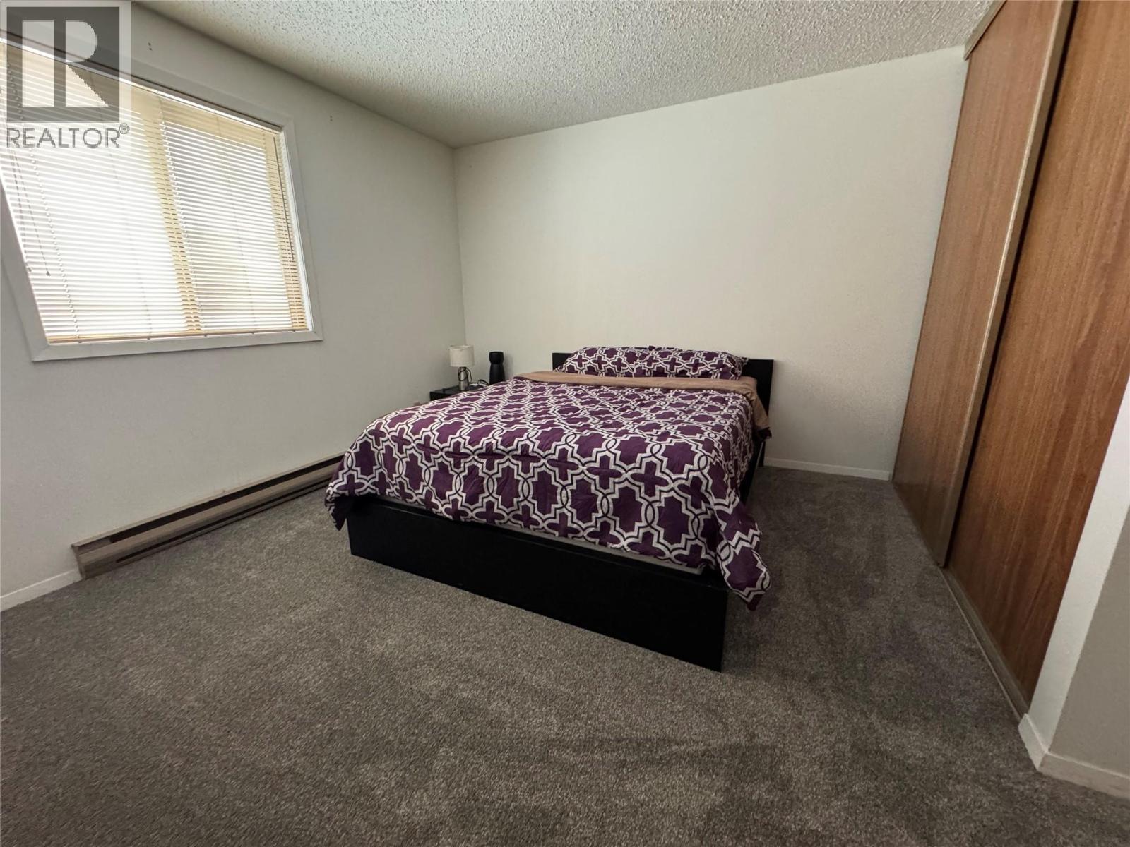 212 Spieker Avenue Unit# 315, Tumbler Ridge, BC - Indoor Photo Showing Bedroom