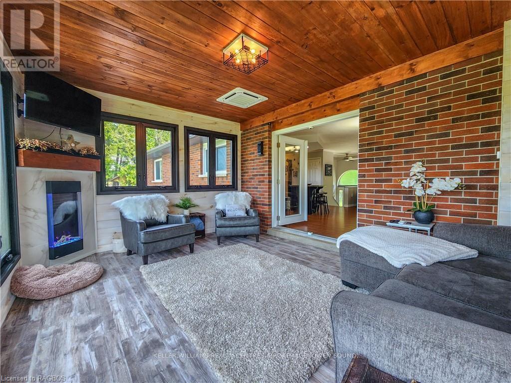 173680 Mulock Road, West Grey, ON - With Fireplace With Deck Patio Veranda With Exterior