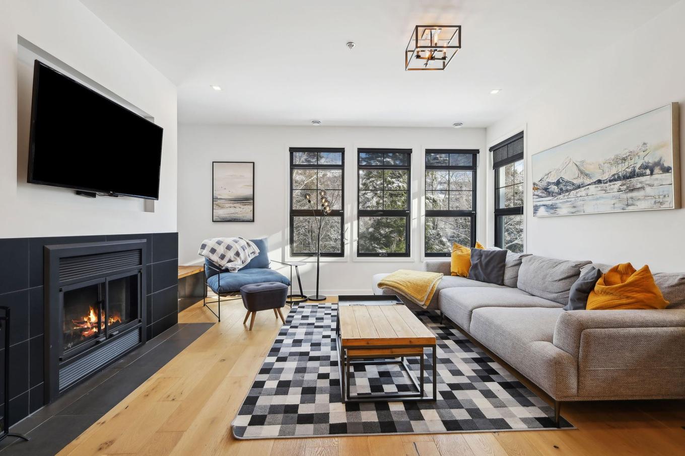 Living room - 2-215 Ch. Des Quatre-Sommets, Mont-Tremblant, QC - Indoor Photo Showing Living Room With Fireplace