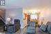 Living room featuring a chandelier and hardwood / wood-style floors