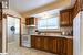 Kitchen with white appliances and sink