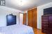 Bedroom featuring a closet and light hardwood / wood-style flooring