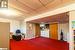 Basement featuring washing machine and dryer, a drop ceiling, and dark carpet