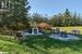 View of yard featuring a fire pit and a patio