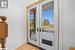 Entryway with french doors and light hardwood / wood-style flooring