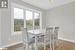 Dining room with light hardwood / wood-style floors