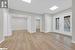 Empty room featuring light hardwood / wood-style floors and french doors