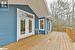 Wooden deck featuring french doors