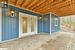 Entrance to property with a patio and french doors