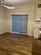 Unfurnished dining area featuring dark wood-type flooring