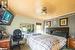 Bedroom with ornamental molding, carpet, and ceiling fan