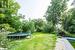 View of yard featuring a trampoline