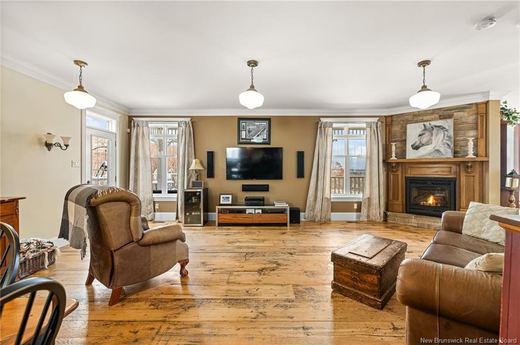 129 Ammon Rd, Ammon, NB - Indoor Photo Showing Living Room With Fireplace