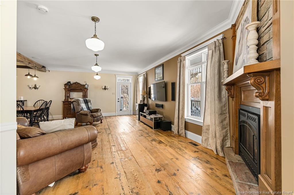 129 Ammon Rd, Ammon, NB - Indoor Photo Showing Living Room With Fireplace