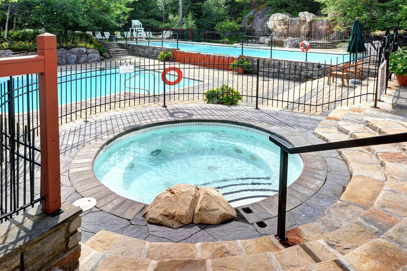 Hot tub - 2-209 Ch. Des Quatre-Sommets, Mont-Tremblant, QC - Outdoor With In Ground Pool With Backyard