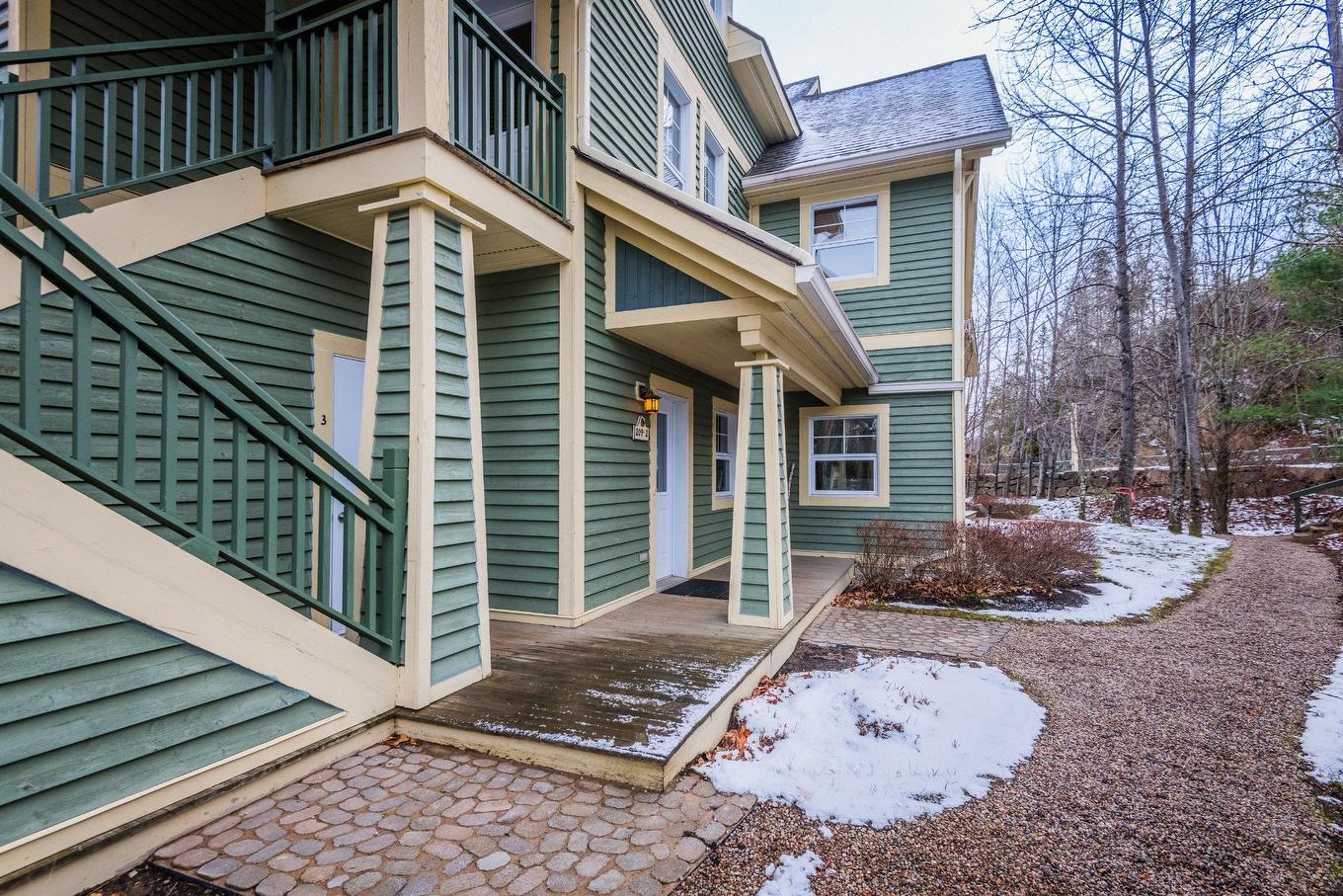Back facade - 2-209 Ch. Des Quatre-Sommets, Mont-Tremblant, QC - Outdoor With Exterior