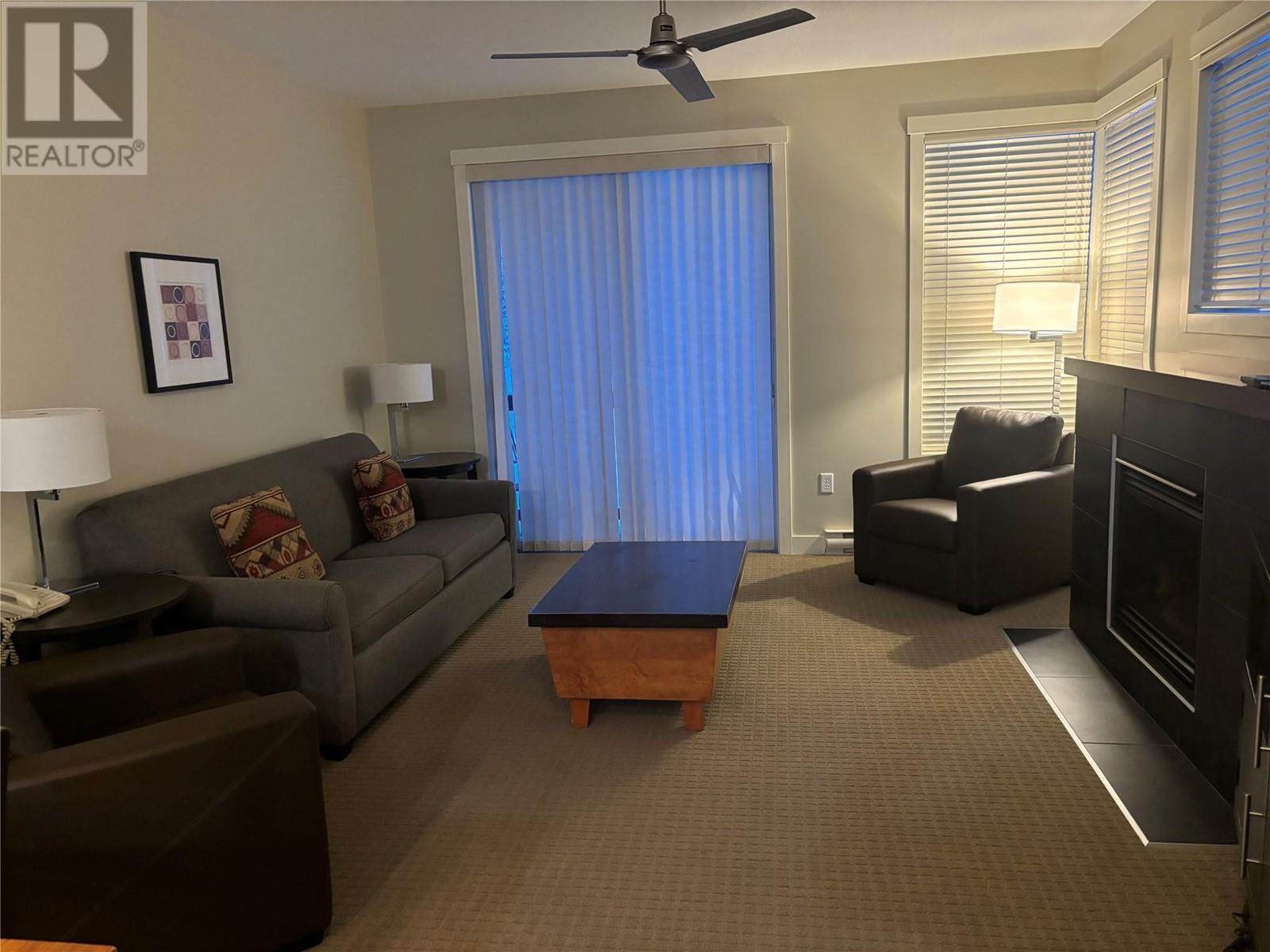2049 Summit Drive Unit# 314D, Panorama, BC - Indoor Photo Showing Living Room With Fireplace