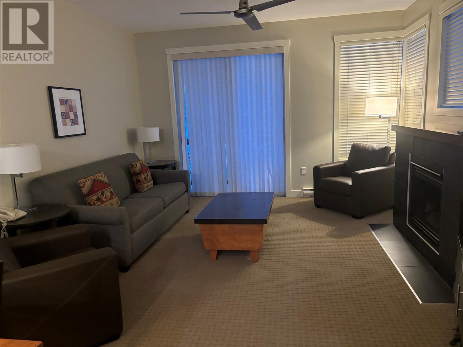 2049 Summit Drive Unit# 314D, Panorama, BC - Indoor Photo Showing Living Room With Fireplace