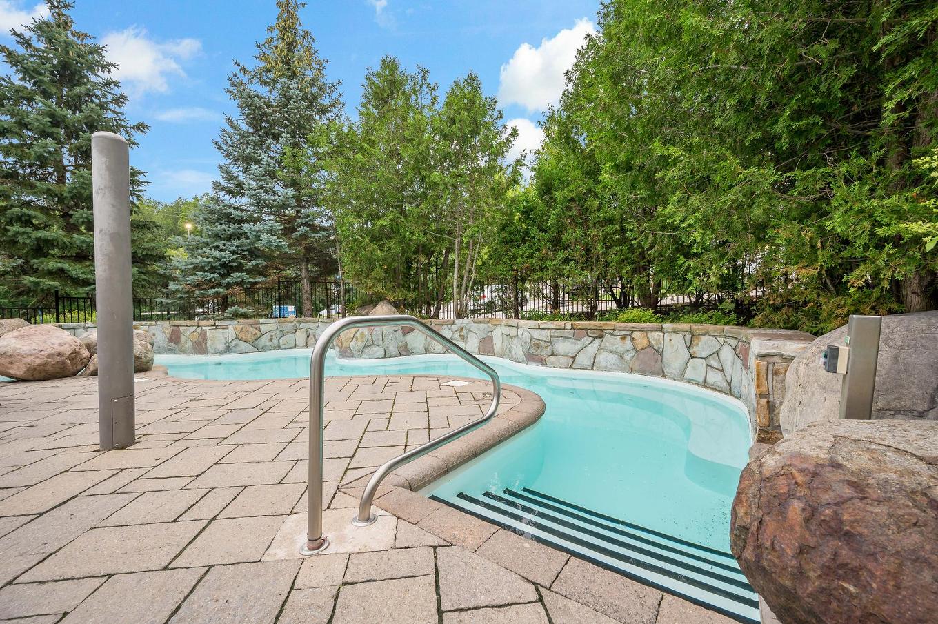 Hot tub - 208-3035 Ch. De La Chapelle, Mont-Tremblant, QC - Outdoor With In Ground Pool