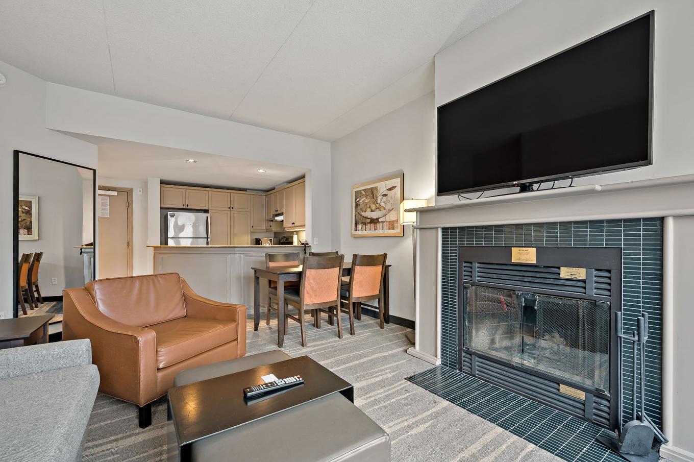 Living room - 208-3035 Ch. De La Chapelle, Mont-Tremblant, QC - Indoor Photo Showing Living Room With Fireplace