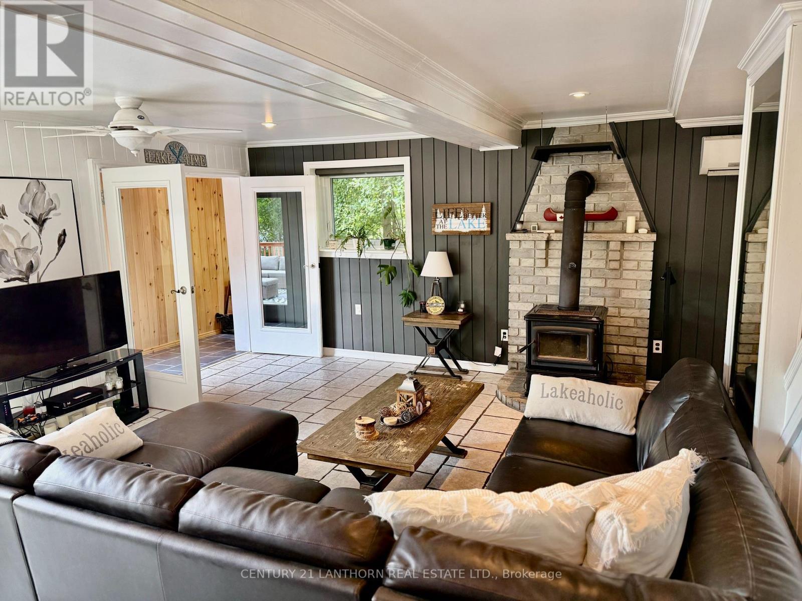 177 Camp Lane, Tweed (Hungerford (Twp)), ON - Indoor Photo Showing Living Room With Fireplace