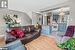 Living room featuring light hardwood / wood-style floors and sink