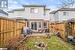 Rear view of property with central air condition unit, an outdoor fire pit, and a wooden deck