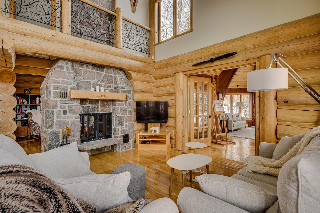 Living room - 105 Ch. Des Ancêtres, Mont-Tremblant, QC - Indoor Photo Showing Living Room With Fireplace