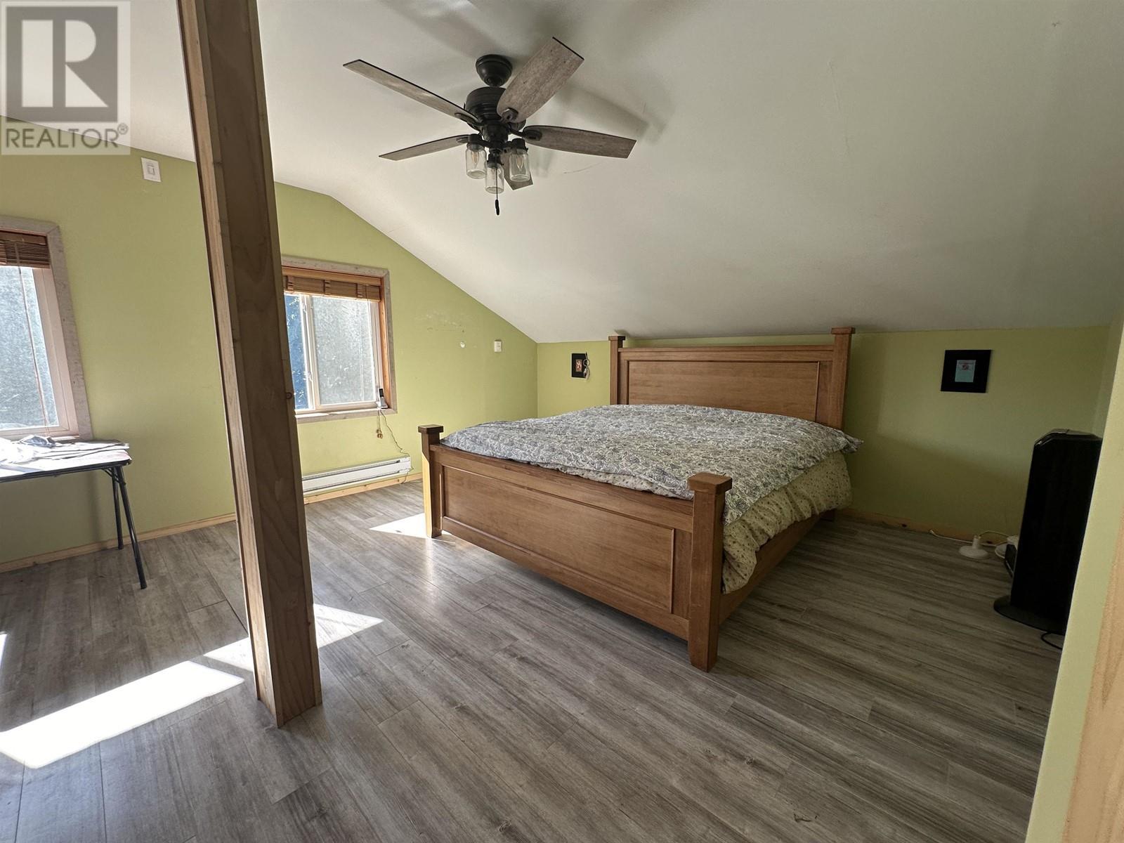 5973 Cedar Creek Road, Likely, BC - Indoor Photo Showing Bedroom