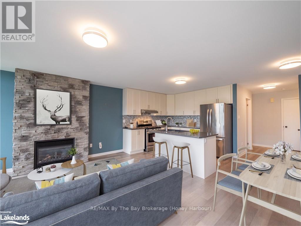 30 - 6 Mulligan Lane, Georgian Bay (Baxter), ON - Indoor With Fireplace