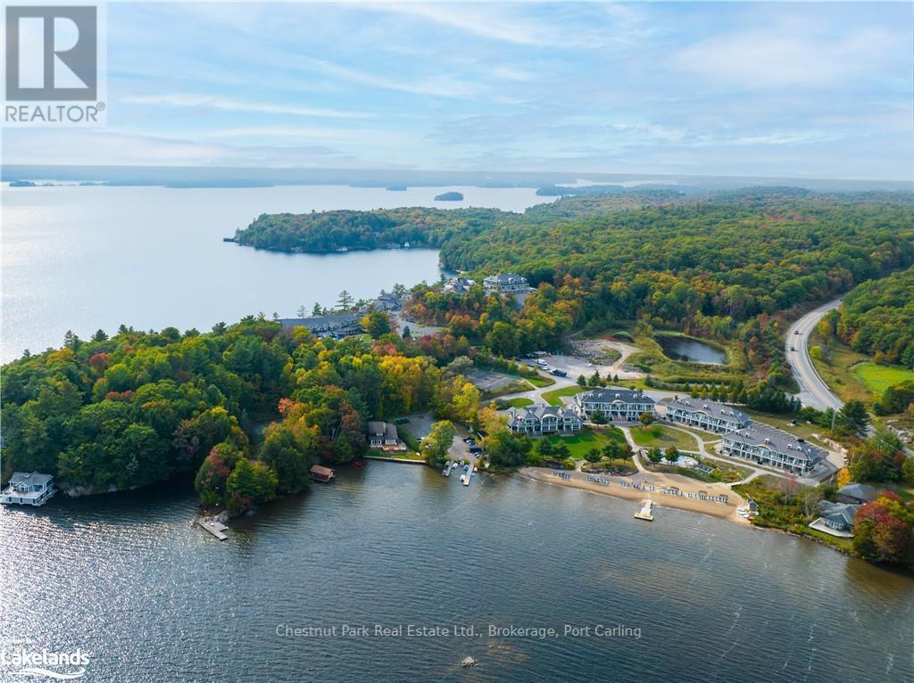 G103-A1 - 1869 Muskoka 118 Road W, Muskoka Lakes (Monck (Muskoka Lakes)), ON - Outdoor With Body Of Water With View
